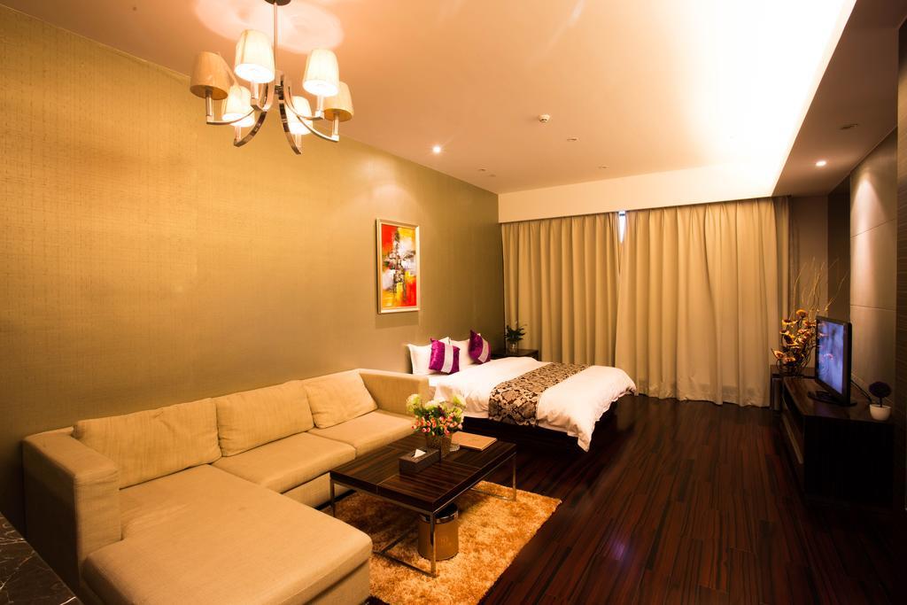 Jufeng Executive Apartment Kanton Zimmer foto