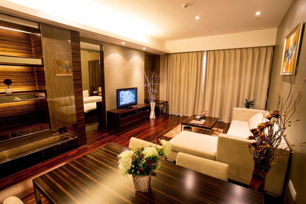 Jufeng Executive Apartment Kanton Zimmer foto